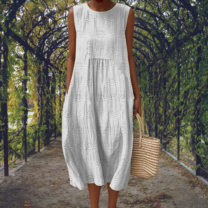 Aikaterini – Elegante vestito smanicato con tasche
