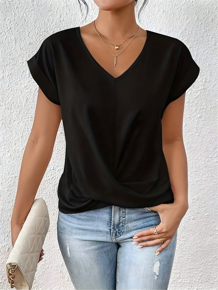 MEIKA™ – Top con scollo a V e dettaglio classico a torsione