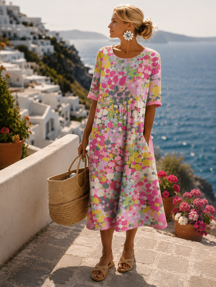Isadora | Abito midi floreale fluido leggero
