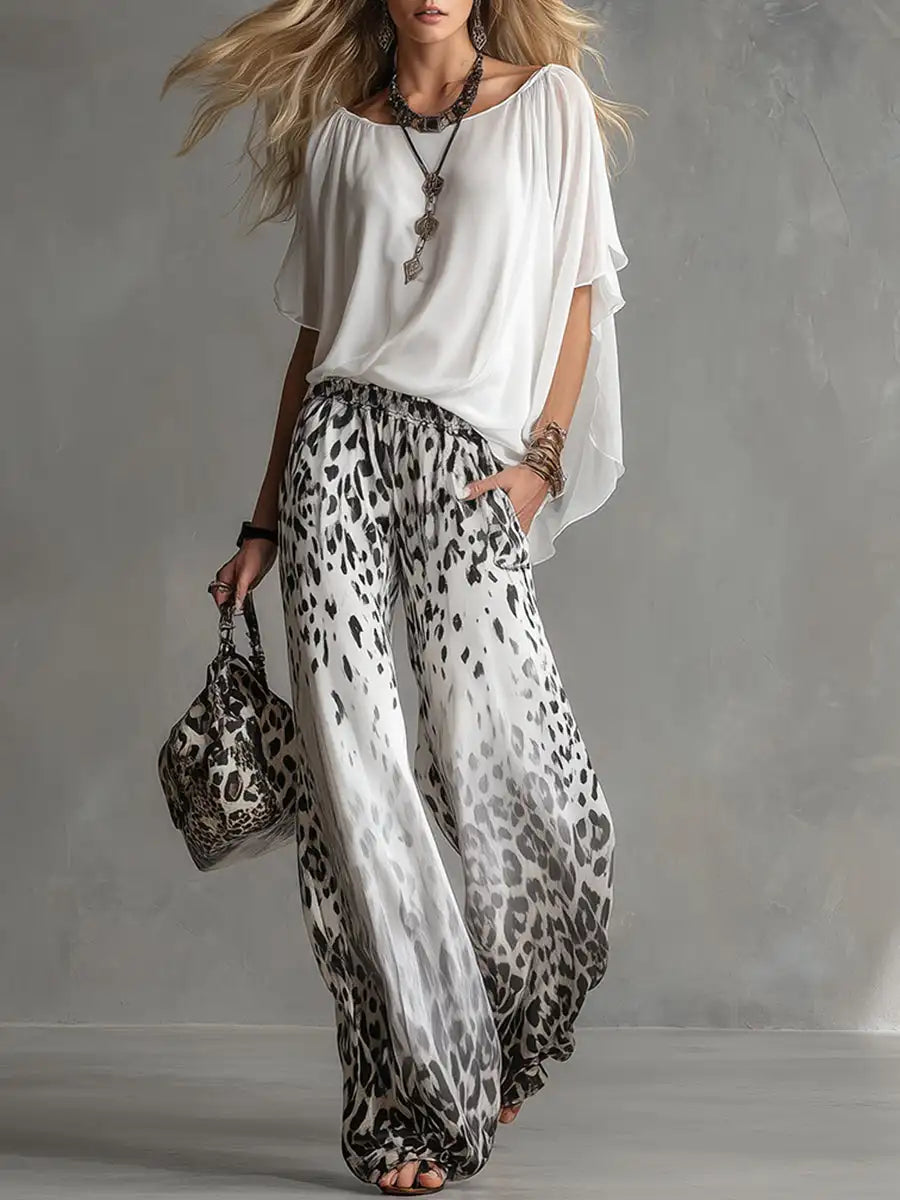Pamela | Completo coordinato blusa con stampa floreale e pantaloni a palazzo