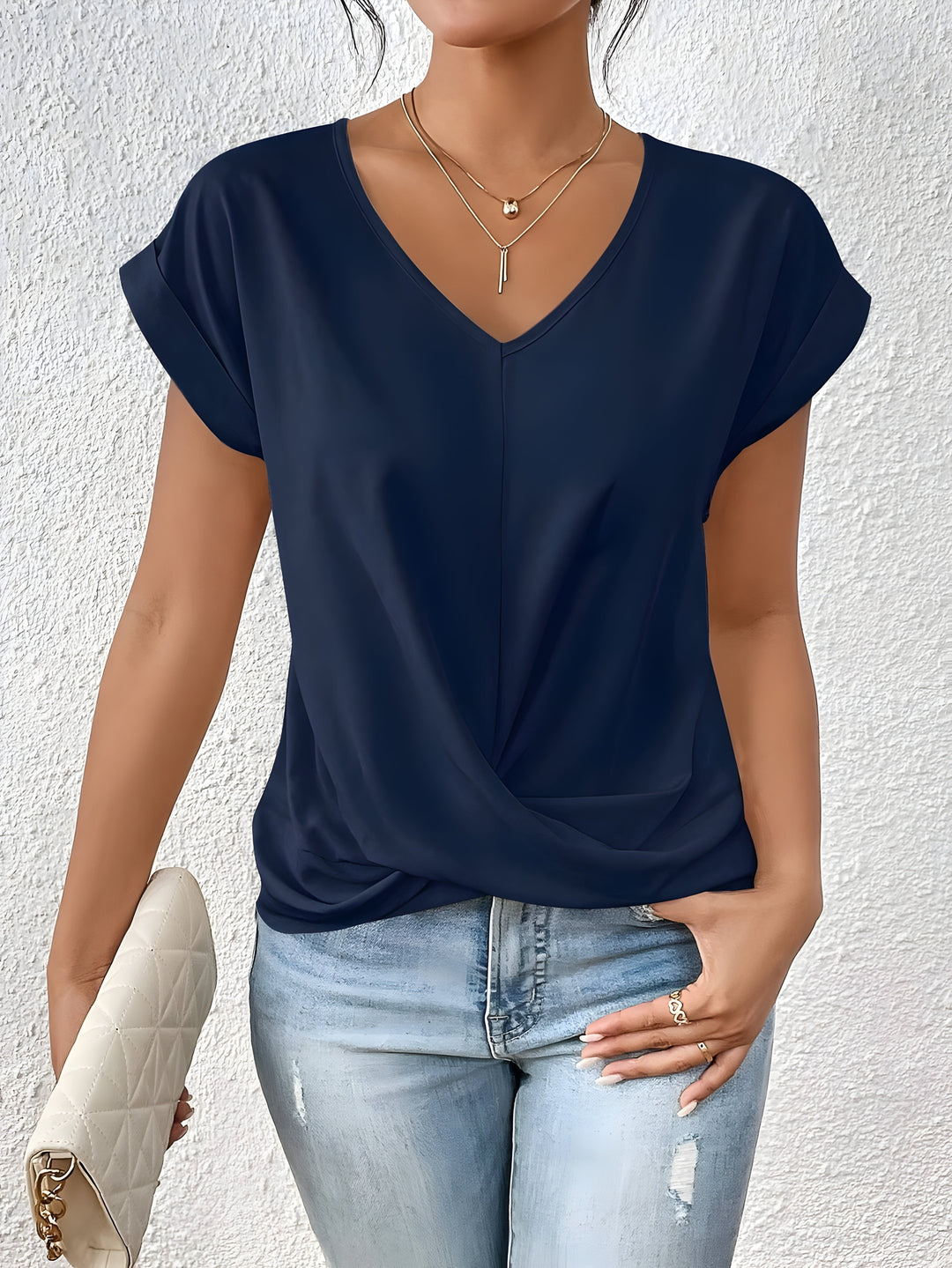 MEIKA™ – Top con scollo a V e dettaglio classico a torsione