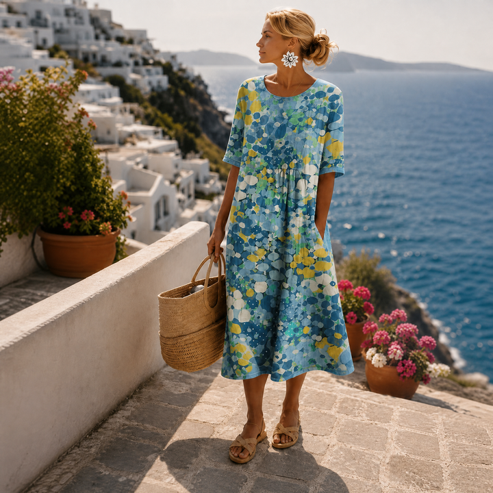 Isadora | Abito midi floreale fluido leggero